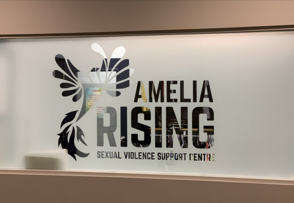 Amelia Rising receiving donation from Airbnb