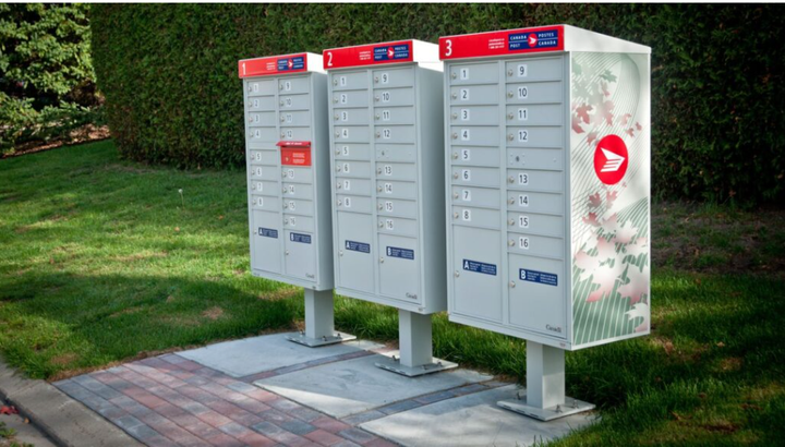 Postal workers strike as Ottawa-signals end of door-to-door delivery