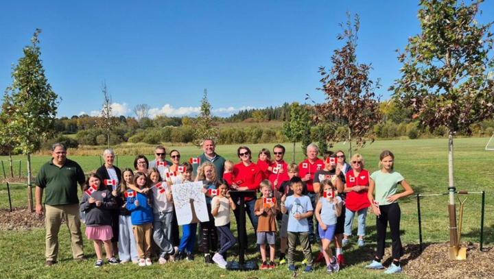 Community tree planting at St. Gregory Catholic School in Powassan